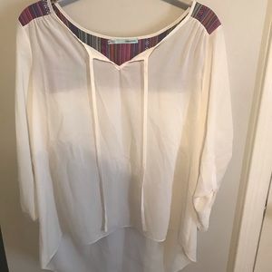 Maurices cream top with colorful back